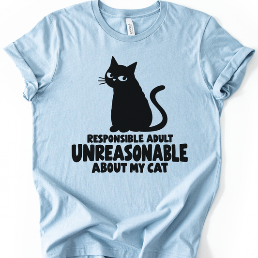 Unreasonable Cat T-Shirt in Light Blue with black cat and Responsible Adult Unreasonable About My Cat design