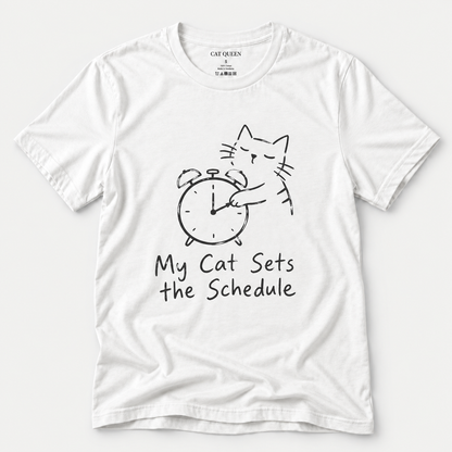 Cat Sets the Schedule T-Shirt in White with cat on an alarm clock graphic.