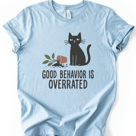 Good Behavior Cat T-Shirt in Light Blue with black cat and knocked-over plant graphic.