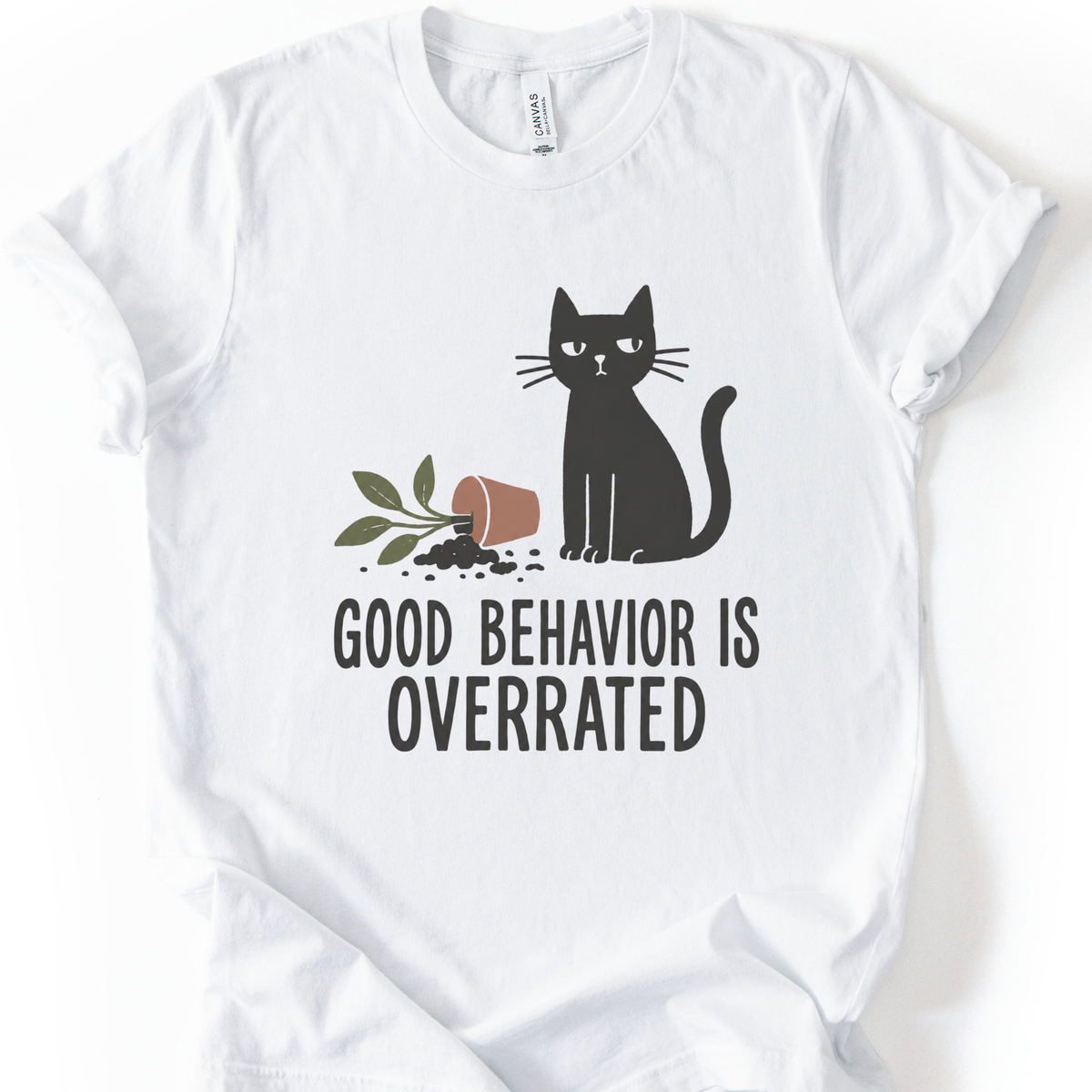 Good Behavior Cat T-Shirt in White with black cat and knocked-over plant graphic.