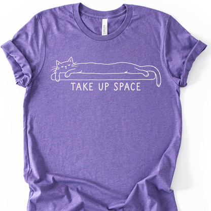 Take Up Space Cat T-Shirt in Heather Team Purple with long lounging cat graphic.