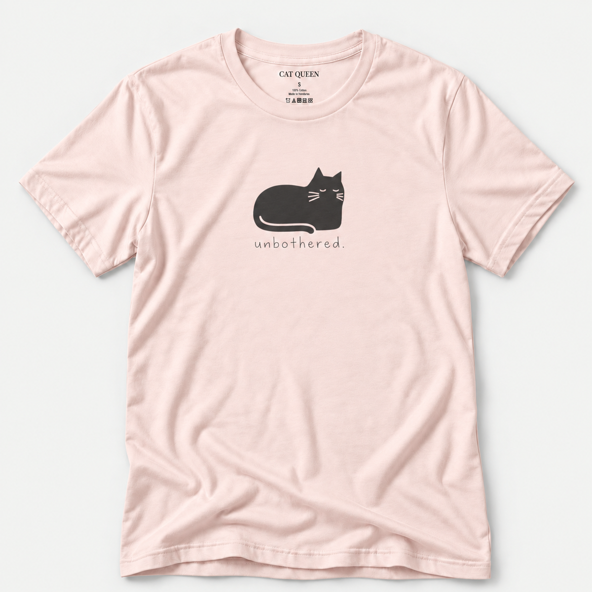 Unbothered T-Shirt in Soft Pink with cat silhouette with whiskers.